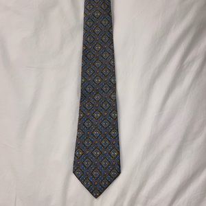 Hermes men’s blue 100% silk tie with geometric chain print and flowers